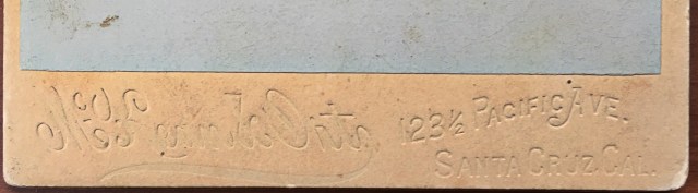 Close-up of embossed border of a photo taken in Santa Cruz in the 1890s.